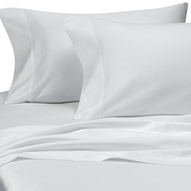 A Duvet Cover Set in white with 1000 thread count of long staple egyptian cotton on a bed