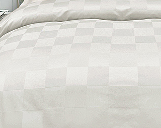 checker white patterned cut Duvet Cover long staple cotton close up on duvet
