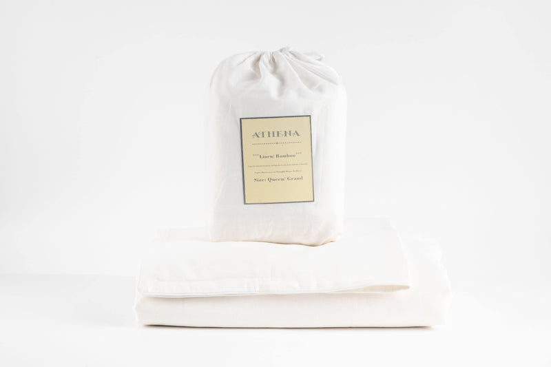 A White Duvet Cover Set made of Linen and Bamboo from Canada with packaging- The  Brand is Athena