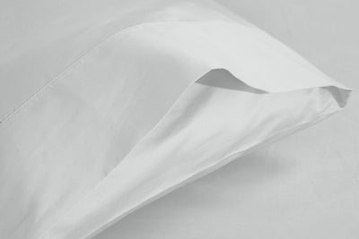A white Bamboo Rayon Pillow Case against a white background from Hometrend, a Canadian bedding store