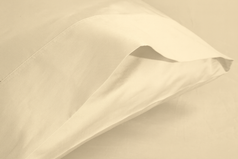 An ivory/cream coloured Bamboo Rayon Pillow Case against a white background from Hometrend, a Canadian bedding store