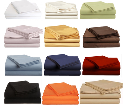An array of 12 100% 400 thread count pillows in a variety of colors