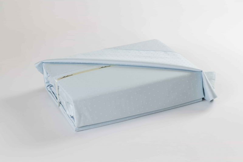 A Swiss Dot bed sheets set with long staple cotton for wholesale in Canada