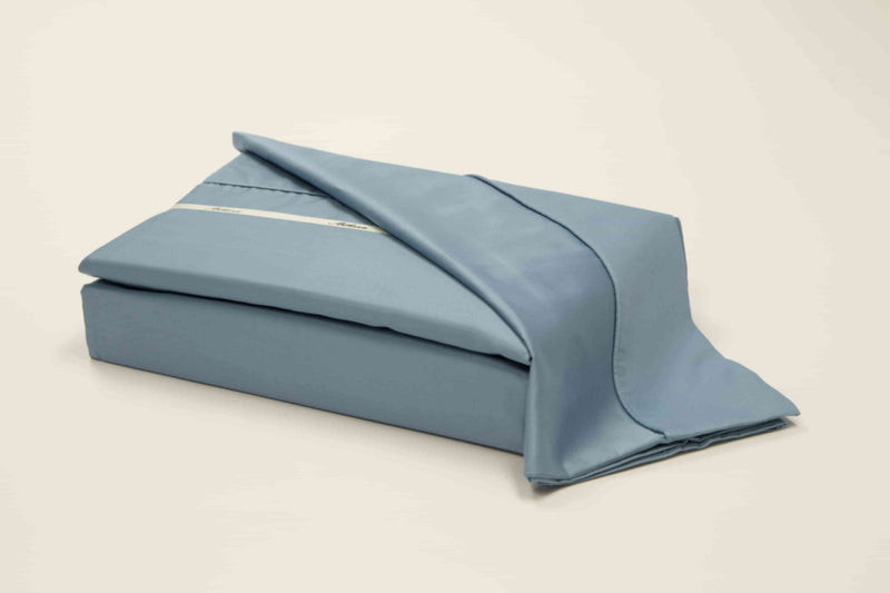 A 100% Long staple egyptian cotton sheet set including pillow cases in an ice blue color
