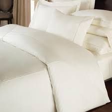 Duvet Cover Set showcasing a bed in a modern setting