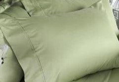 Pillows with a 100% long staple egyptian cotton pillow case in light green or celadon color