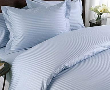 A picture of a 100% egyptian cotton Super duvet cover set in light ice blue